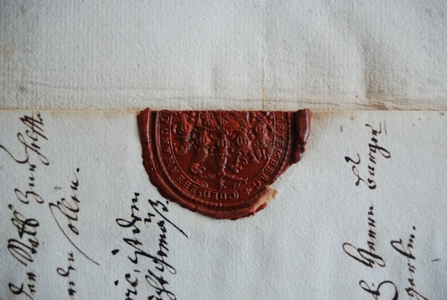 Physical original and photocopy beside an electronic document during a notary review